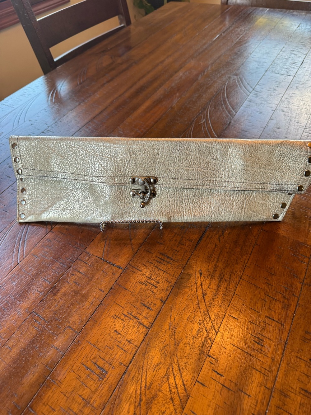 Nailah’s Metallic Pewter Leather Clutch
